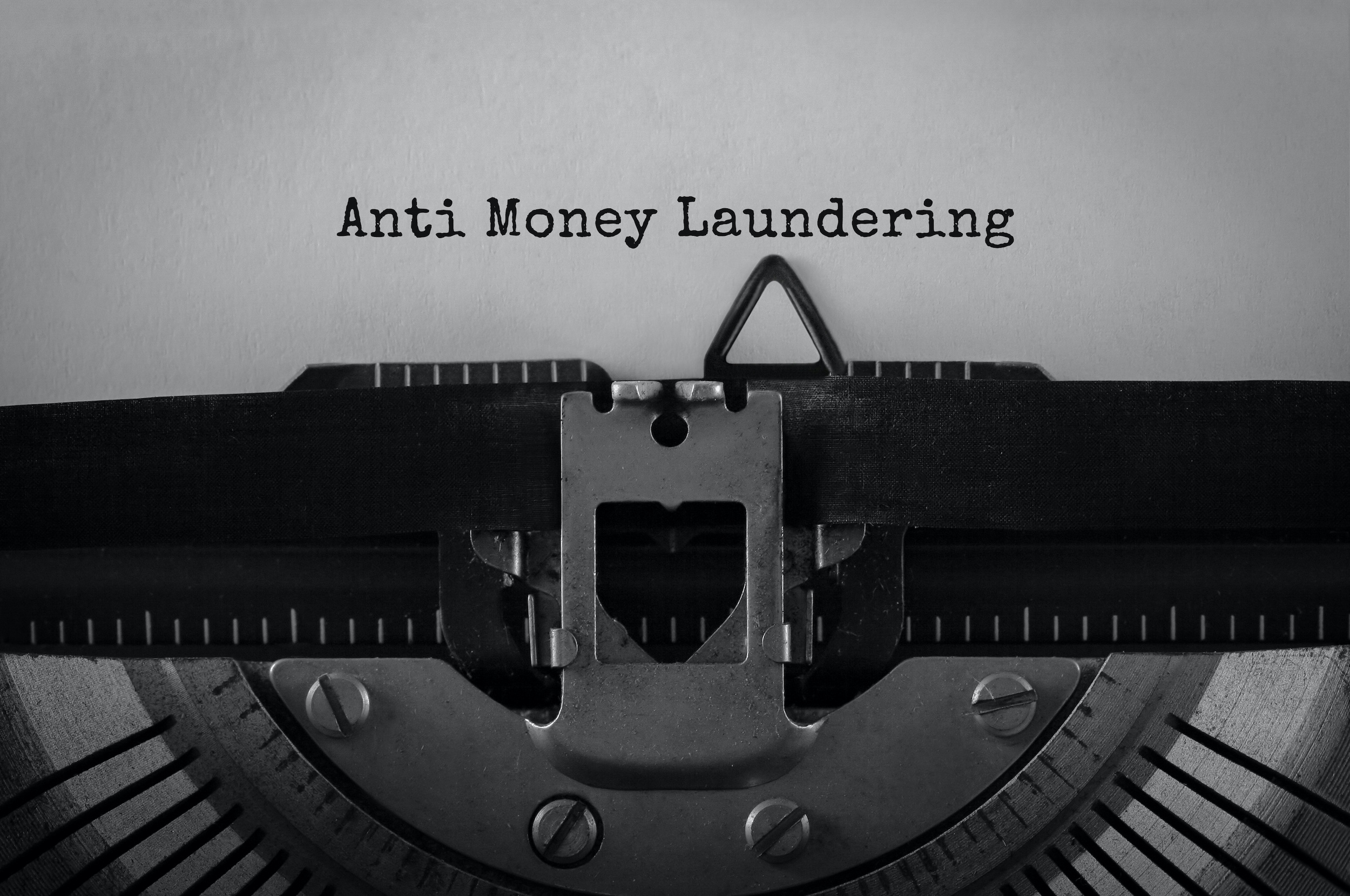 Text Anti Money Laundering typed on retro typewriter